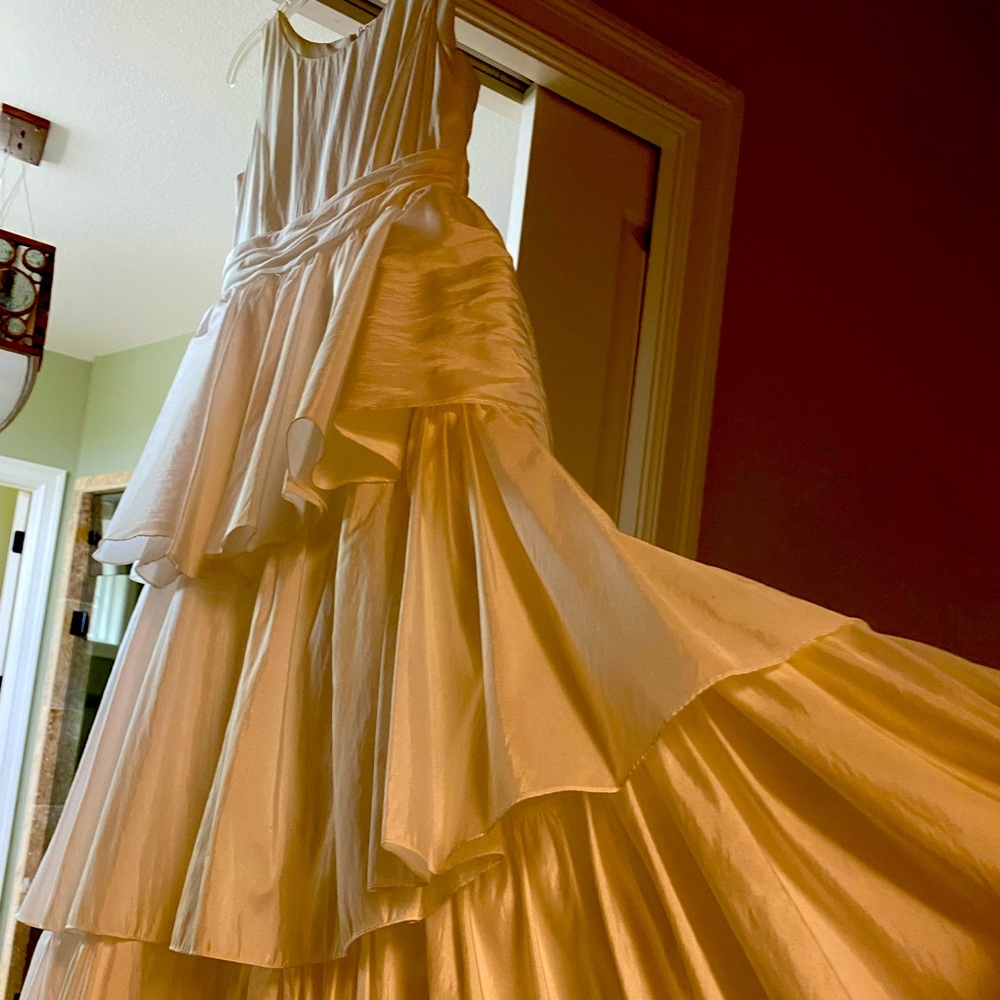 A beautiful white dress good for a flower girl